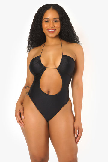 Body negro con aberturas entrecruzadas